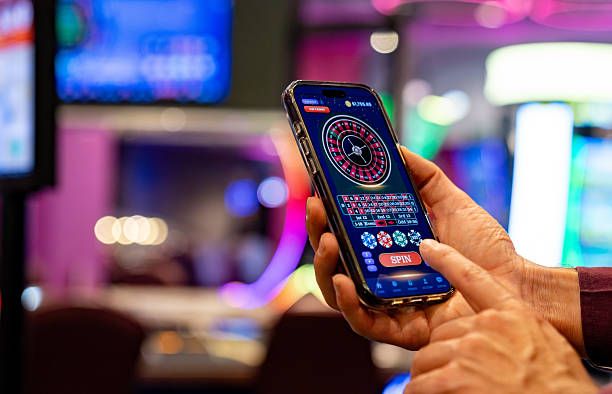 mdg66 iOS Web interface on iPhone showing sportsbook and live tables